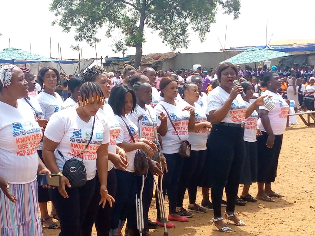 Community-Based Justice Advocates singing the Women's Rights song